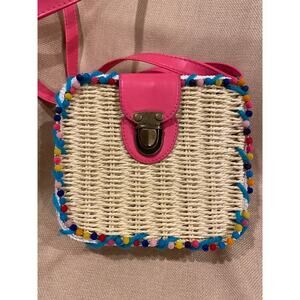 Decorative wicker crossbody with adjustable strap